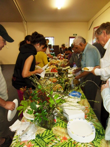 sharing a harvest meal at  the WIC celebration
